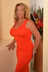 escort Cape Coral in orange dress